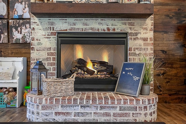 interior details with a fireplace and hardwood / wood-style floors