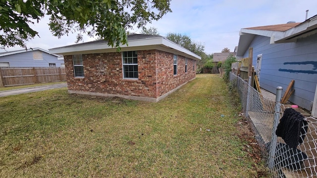 view of home's exterior featuring a lawn