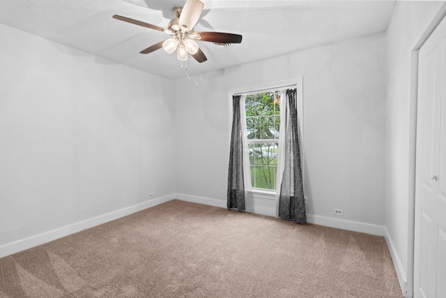 2695 Sandlin St, Beaumont, TX 77707 - spare room with carpet flooring and a ceiling fan