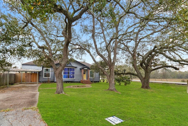 2695 Sandlin St, Beaumont, TX 77707 - view of front facade with concrete driveway