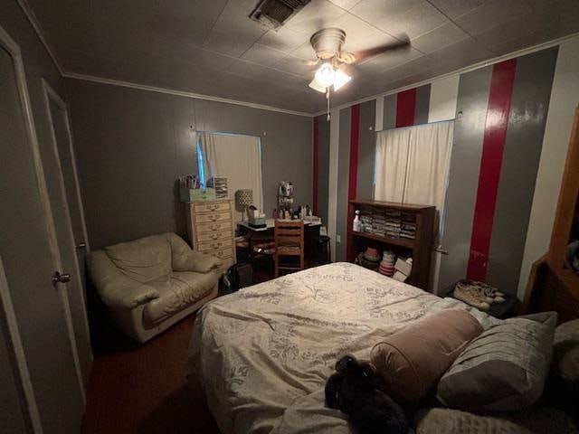885 E Fm 1943 E, Warren, TX 77664 - bedroom with ornamental molding and a ceiling fan