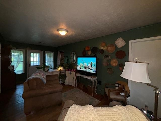 885 E Fm 1943 E, Warren, TX 77664 - living room with wood finished floors