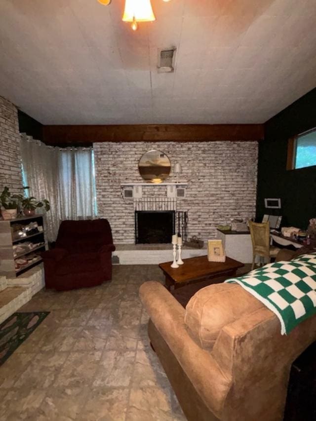 885 E Fm 1943 E, Warren, TX 77664 - living room with a brick fireplace and brick wall