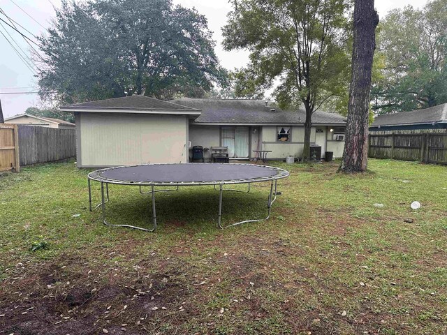 view of yard featuring a trampoline