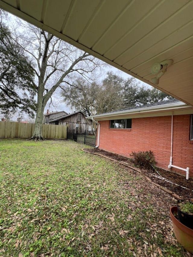 view of yard featuring fence