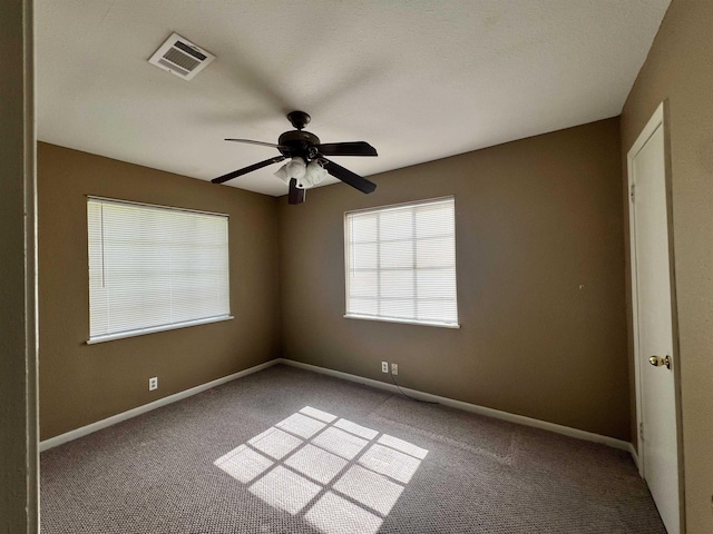 3265 N Willowood Ln, Beaumont, TX 77703 - spare room featuring carpet floors and a ceiling fan