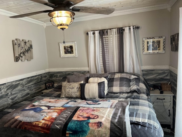 bedroom featuring ceiling fan and ornamental molding