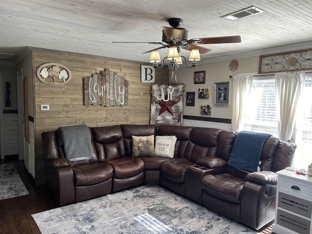 living room with ceiling fan, crown molding, wooden walls, wooden ceiling, and hardwood / wood-style floors