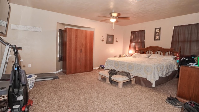 bedroom featuring carpet flooring, ceiling fan, and baseboards