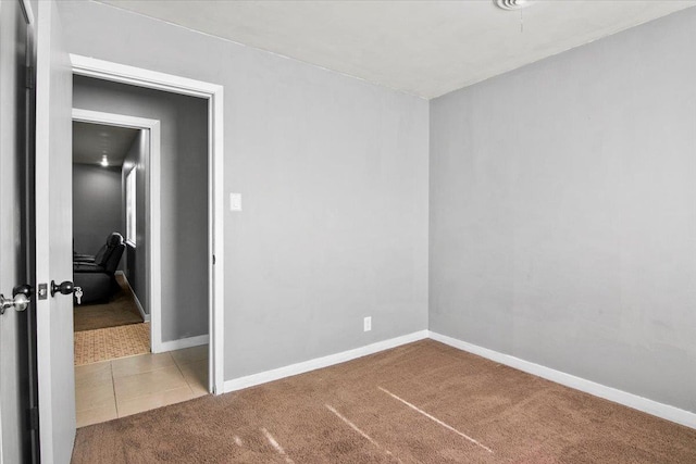 view of carpeted spare room