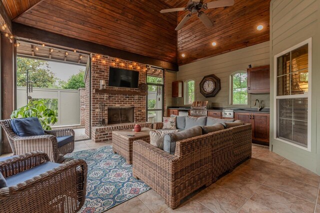 7705 Savannah St, Beaumont, TX 77707 - living room with wood ceiling, ceiling fan, high vaulted ceiling, an outdoor brick fireplace, and recessed lighting