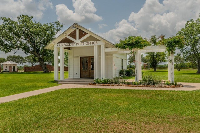 7705 Savannah St, Beaumont, TX 77707 - view of front of home with a front lawn and french doors