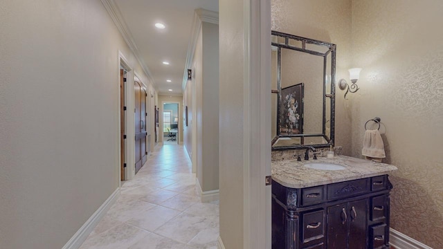 7705 Savannah St, Beaumont, TX 77707 - hall featuring a sink, baseboards, crown molding, light tile patterned floors, and recessed lighting