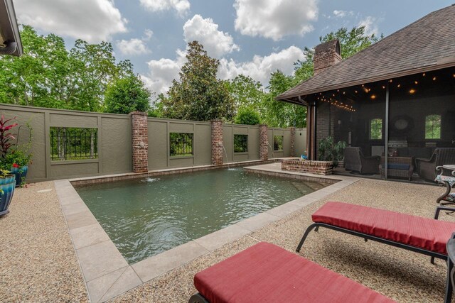 7705 Savannah St, Beaumont, TX 77707 - view of swimming pool with a patio area