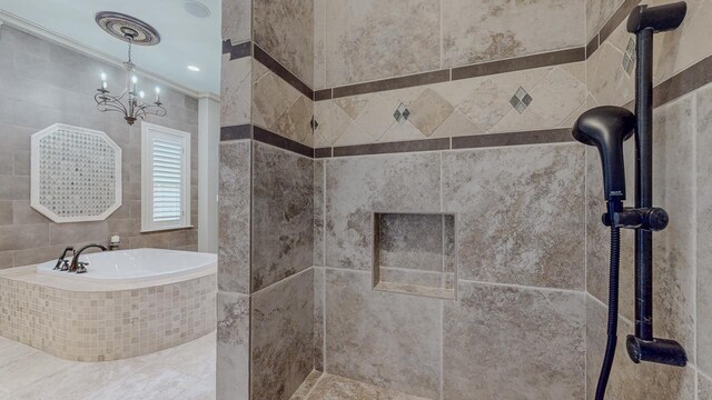 7705 Savannah St, Beaumont, TX 77707 - bathroom featuring a tile shower, a garden tub, and crown molding