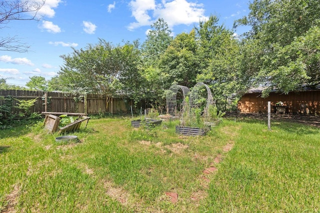 305 White Oak Trl, Bridge City, TX 77611 - view of yard featuring a garden