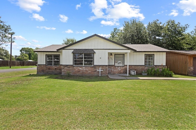 305 White Oak Trl, Bridge City, TX 77611 - view of front of house with brick siding