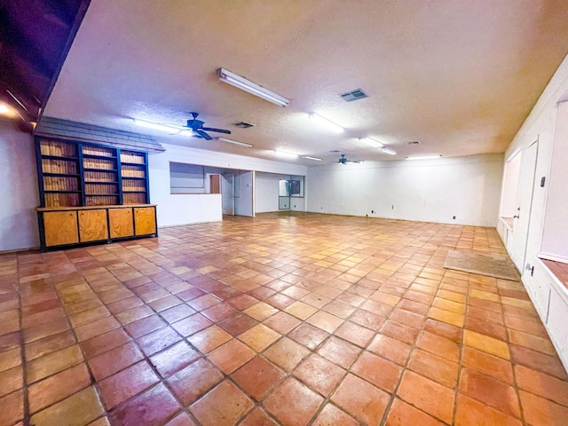 empty room with a textured ceiling