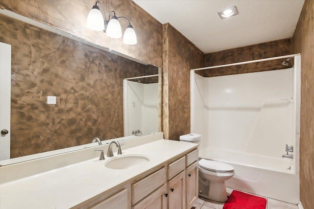 full bathroom with tile patterned flooring, vanity,  shower combination, and toilet