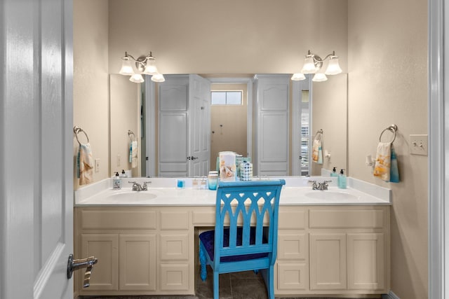 7675 Myrtle Beach Dr, Beaumont, TX 77707 - bathroom featuring double vanity and tile patterned floors