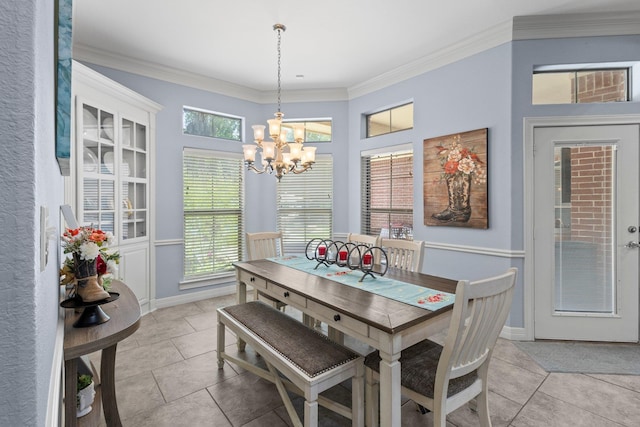 7675 Myrtle Beach Dr, Beaumont, TX 77707 - dining space featuring a chandelier, light tile patterned flooring, plenty of natural light, and ornamental molding
