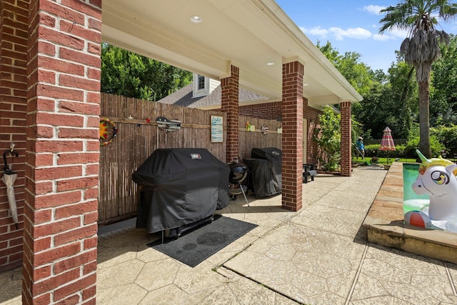 7675 Myrtle Beach Dr, Beaumont, TX 77707 - view of patio / terrace with a grill