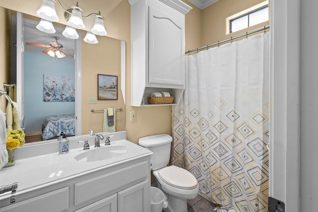 7675 Myrtle Beach Dr, Beaumont, TX 77707 - ensuite bathroom with vanity and ceiling fan
