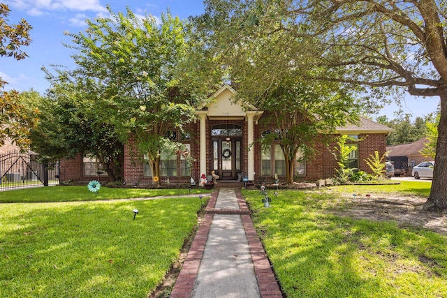 7675 Myrtle Beach Dr, Beaumont, TX 77707 - obstructed view of property featuring brick siding
