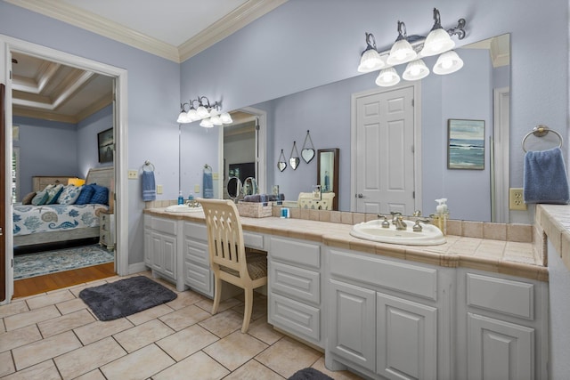 7675 Myrtle Beach Dr, Beaumont, TX 77707 - ensuite bathroom with double vanity, crown molding, and tile patterned floors