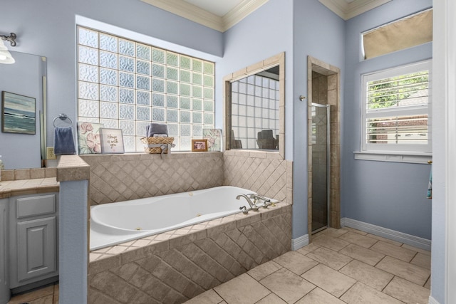 7675 Myrtle Beach Dr, Beaumont, TX 77707 - bathroom with vanity, a tub with jets, a stall shower, crown molding, and tile patterned flooring