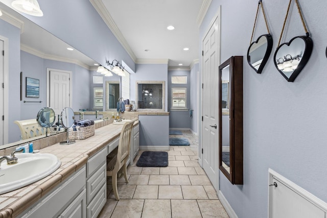 7675 Myrtle Beach Dr, Beaumont, TX 77707 - bathroom featuring double vanity, crown molding, tile patterned flooring, and recessed lighting