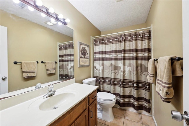 1416 23rd St, Nederland, TX 77627 - bathroom featuring vanity, a textured ceiling, tile patterned flooring, and curtained shower