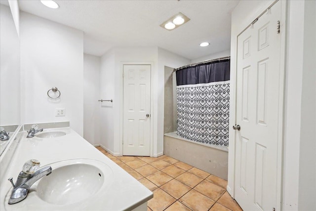 1416 23rd St, Nederland, TX 77627 - bathroom with double vanity, shower / bath combo with shower curtain, tile patterned floors, and recessed lighting