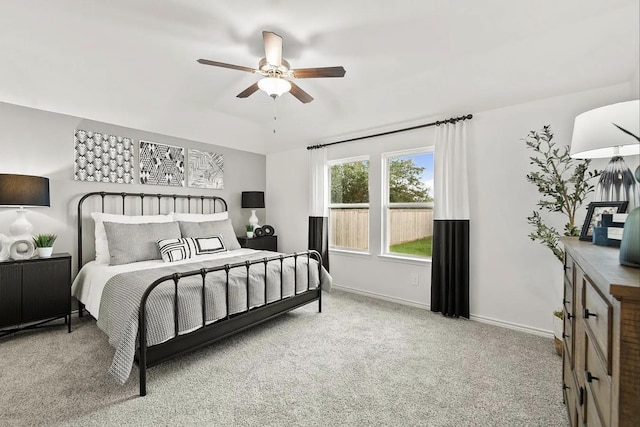 bedroom featuring baseboards, carpet, and ceiling fan