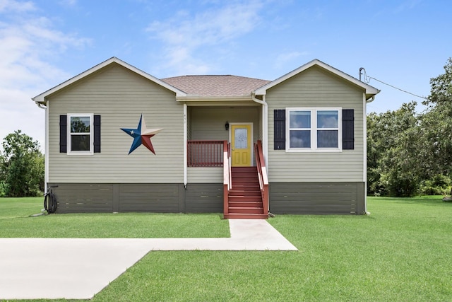 451 Lene Ln, Beaumont, TX 77705 - view of front of home with a front lawn and a shingled roof