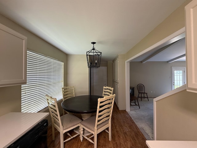 445 Longmeadow, Beaumont, TX 77707 - dining space with a chandelier and dark wood-style floors