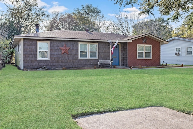 ranch-style house featuring a front yard