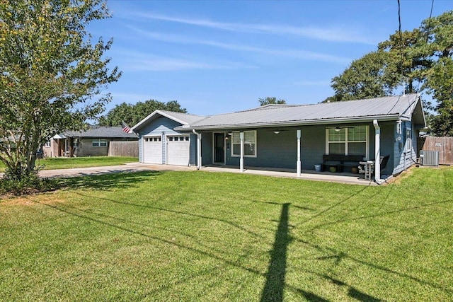 single story home featuring a porch, a garage, a front lawn, and cooling unit