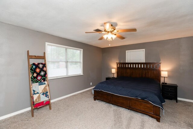 410 Creekwood St, Vidor, TX 77662 - bedroom with carpet, baseboards, and ceiling fan