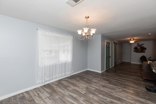 410 Creekwood St, Vidor, TX 77662 - unfurnished room featuring wood finished floors, baseboards, a chandelier, and a ceiling fan