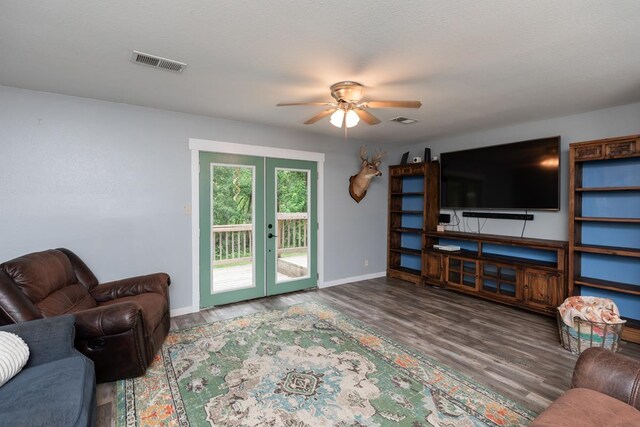410 Creekwood St, Vidor, TX 77662 - living room with french doors, ceiling fan, wood finished floors, and baseboards