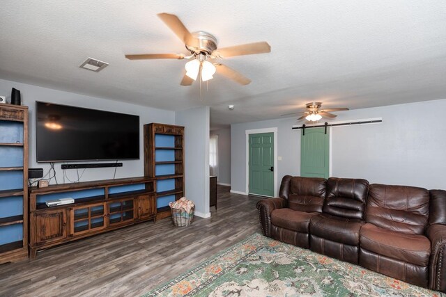 410 Creekwood St, Vidor, TX 77662 - living room featuring ceiling fan, wood finished floors, and baseboards
