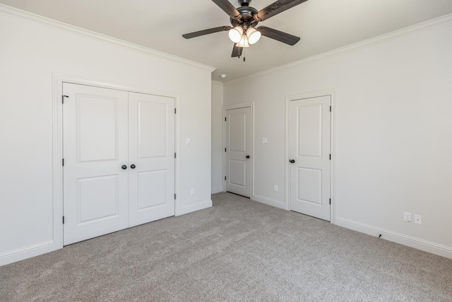 unfurnished bedroom with light carpet, ornamental molding, and ceiling fan