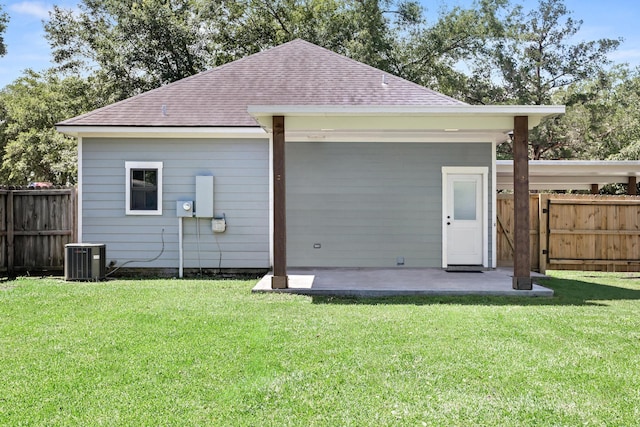 4450 W Brown St, Orange, TX 77630 - rear view of property with roof with shingles, central AC, and a patio area
