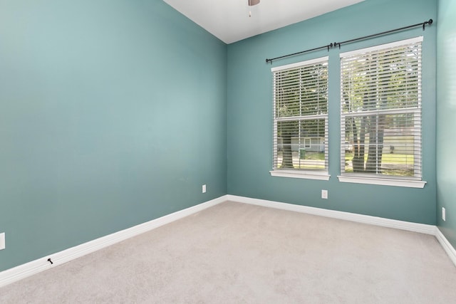 4450 W Brown St, Orange, TX 77630 - carpeted empty room featuring baseboards and ceiling fan