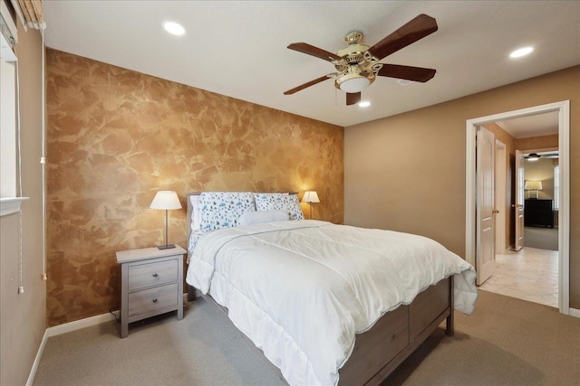 4820 Ashland St, Beaumont, TX 77706 - bedroom with recessed lighting, an accent wall, and wallpapered walls