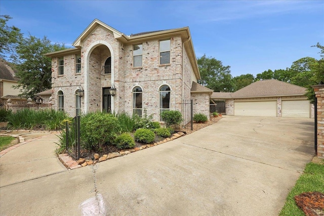 4820 Ashland St, Beaumont, TX 77706 - french country home featuring brick siding and a detached garage