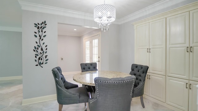 dining space with an inviting chandelier, baseboards, and ornamental molding