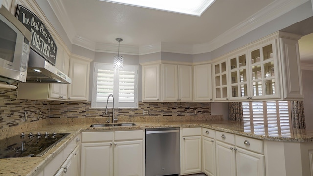kitchen featuring a sink, black electric stovetop, white microwave, dishwasher, and decorative backsplash