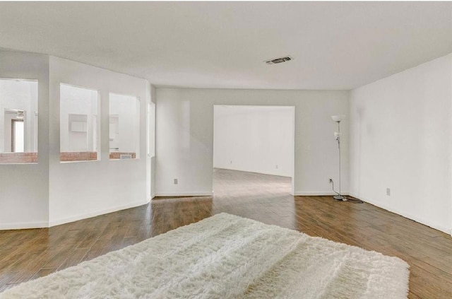 spare room featuring hardwood / wood-style flooring